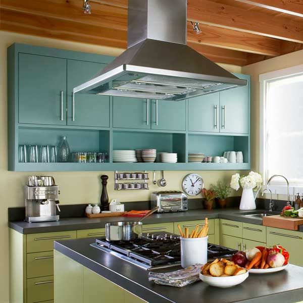 A large kitchen vent hood over a stove.